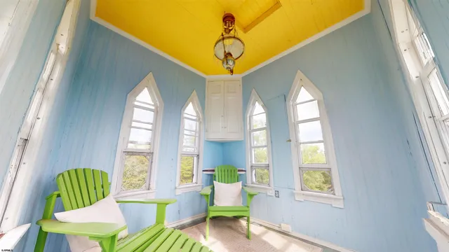 an aerial view of a house with a lake view