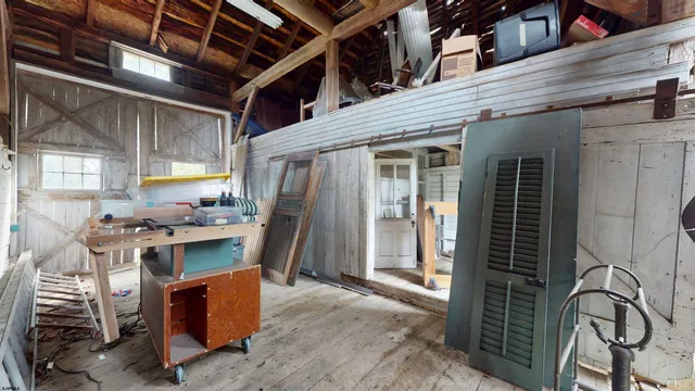 an aerial view of a highlighted house