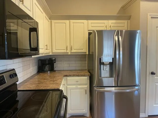 a bathroom with a double vanity sink and mirror