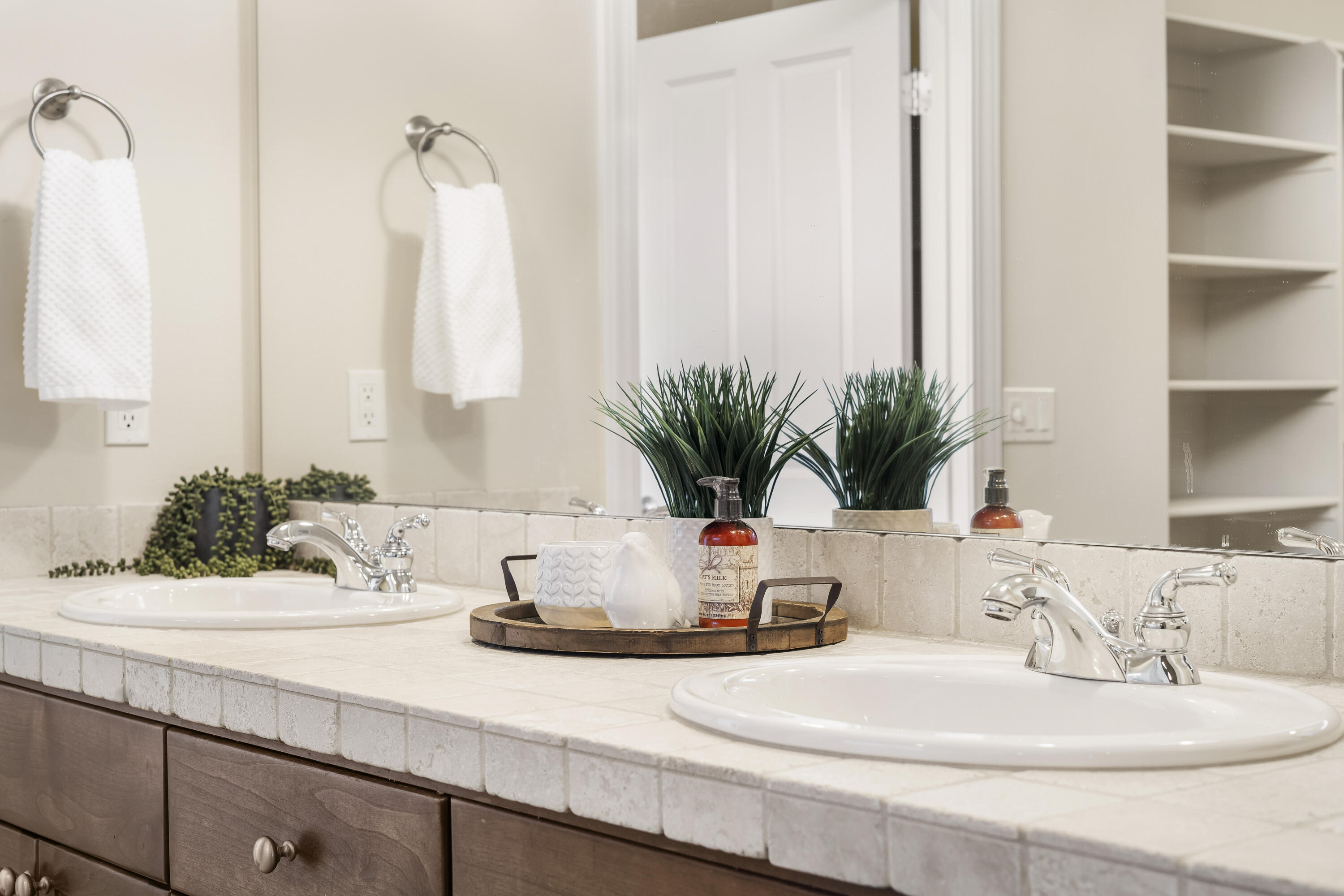 784 Ribbon Falls Road Redmond, OR 97756 - Photo 16 of 79 a close view of sink and mirror
