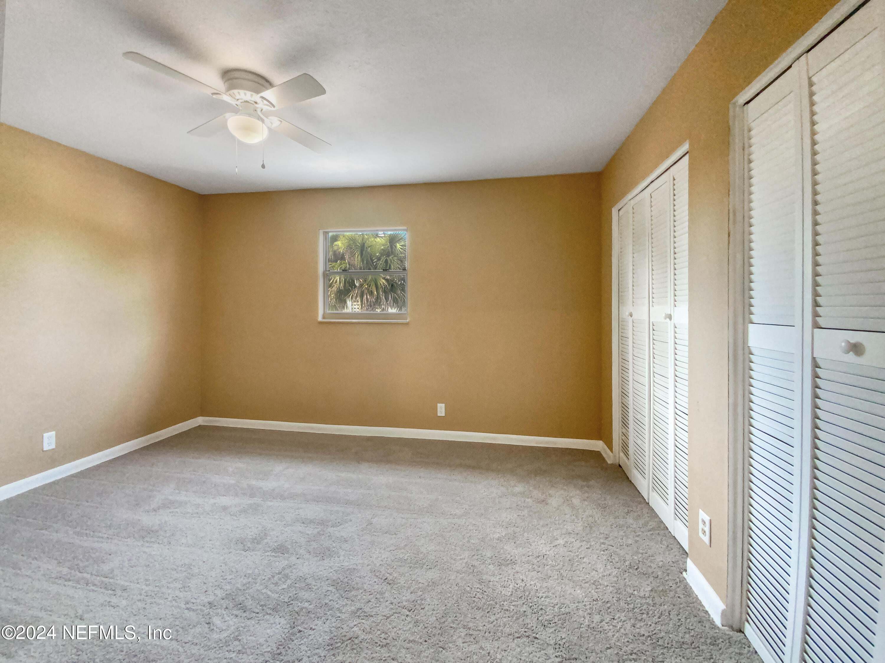 710 Cavalla Road Atlantic Beach, FL 32233 - Photo 11 of 17 a view of an empty room with a window