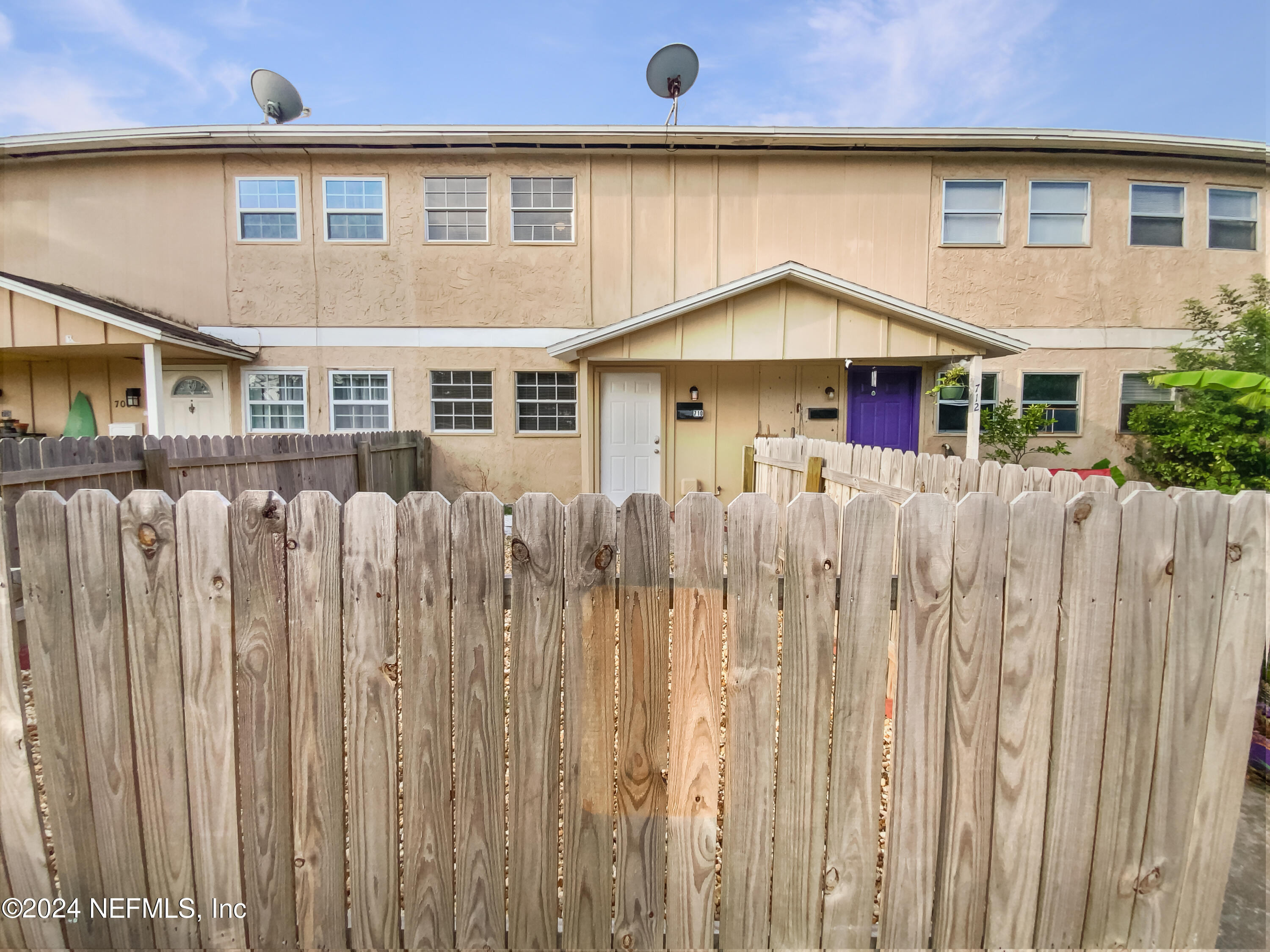 710 Cavalla Road Atlantic Beach, FL 32233 - Photo 17 of 17 a front view of a house with a garden