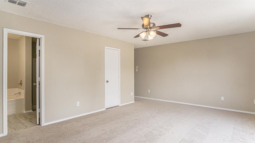 8732 Hunters Point Way Fort Worth, TX 76123 - Photo 15 of 24 a view of an empty room
