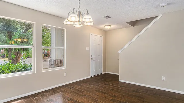 a view of livingroom with hardwood floor and window