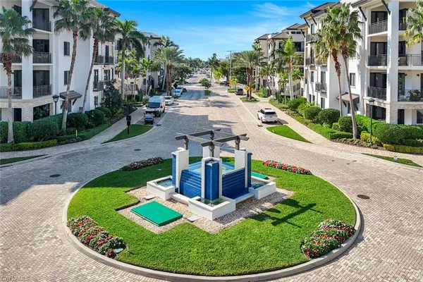a view of a swimming pool with a yard