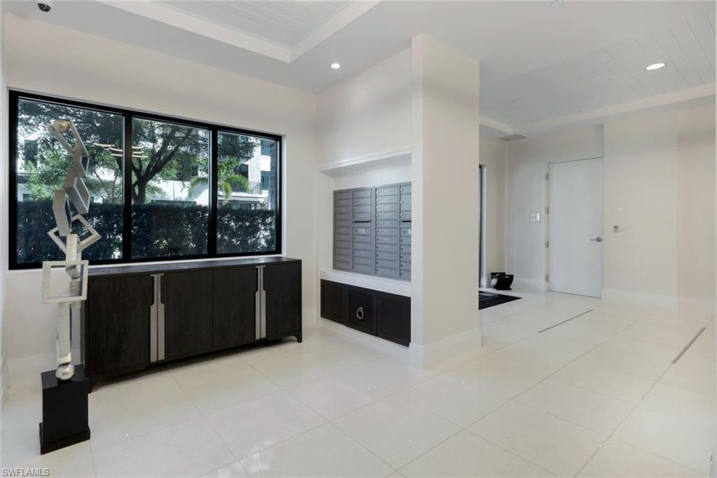 1030 3rd Avenue South, Unit 419 Naples, FL 34102 - Photo 23 of 29 a view of an empty room with a window