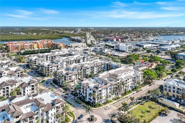 an aerial view of residential building with city view