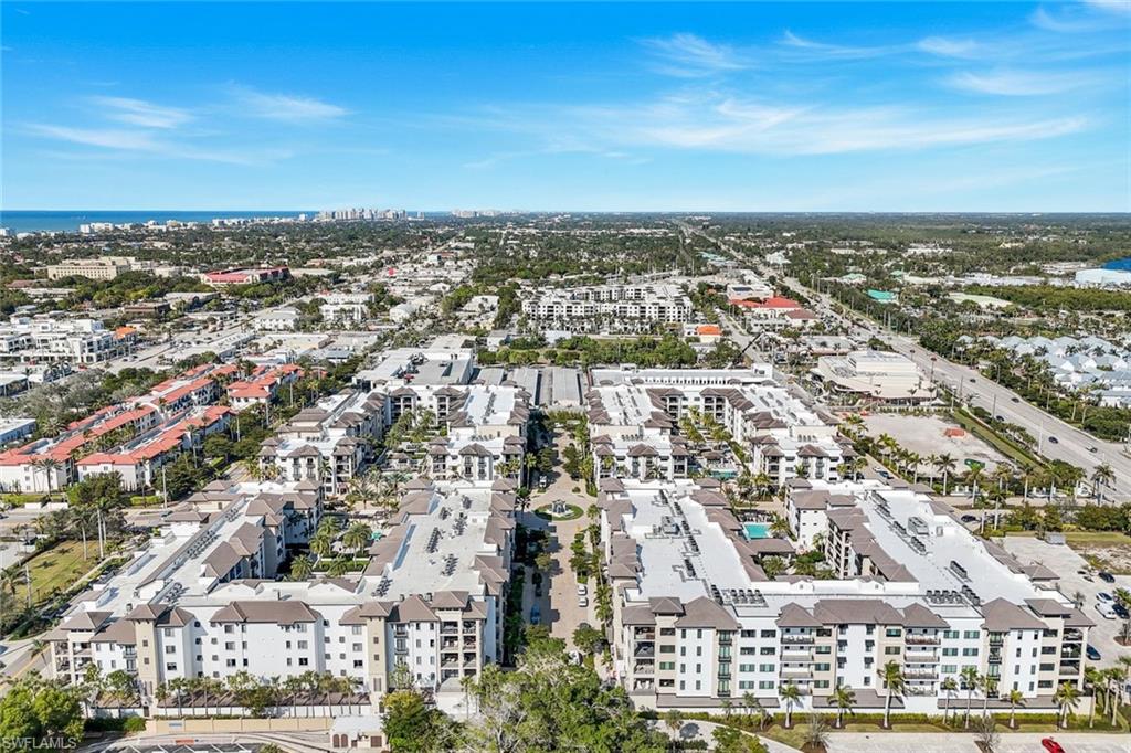 1030 3rd Avenue South, Unit 419 Naples, FL 34102 - Photo 27 of 29 an aerial view of residential building with city view