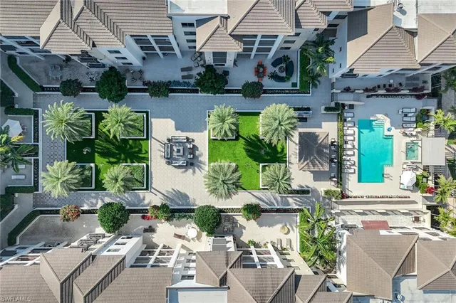 an aerial view of residential building with city view