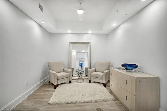 a bedroom with bed and window