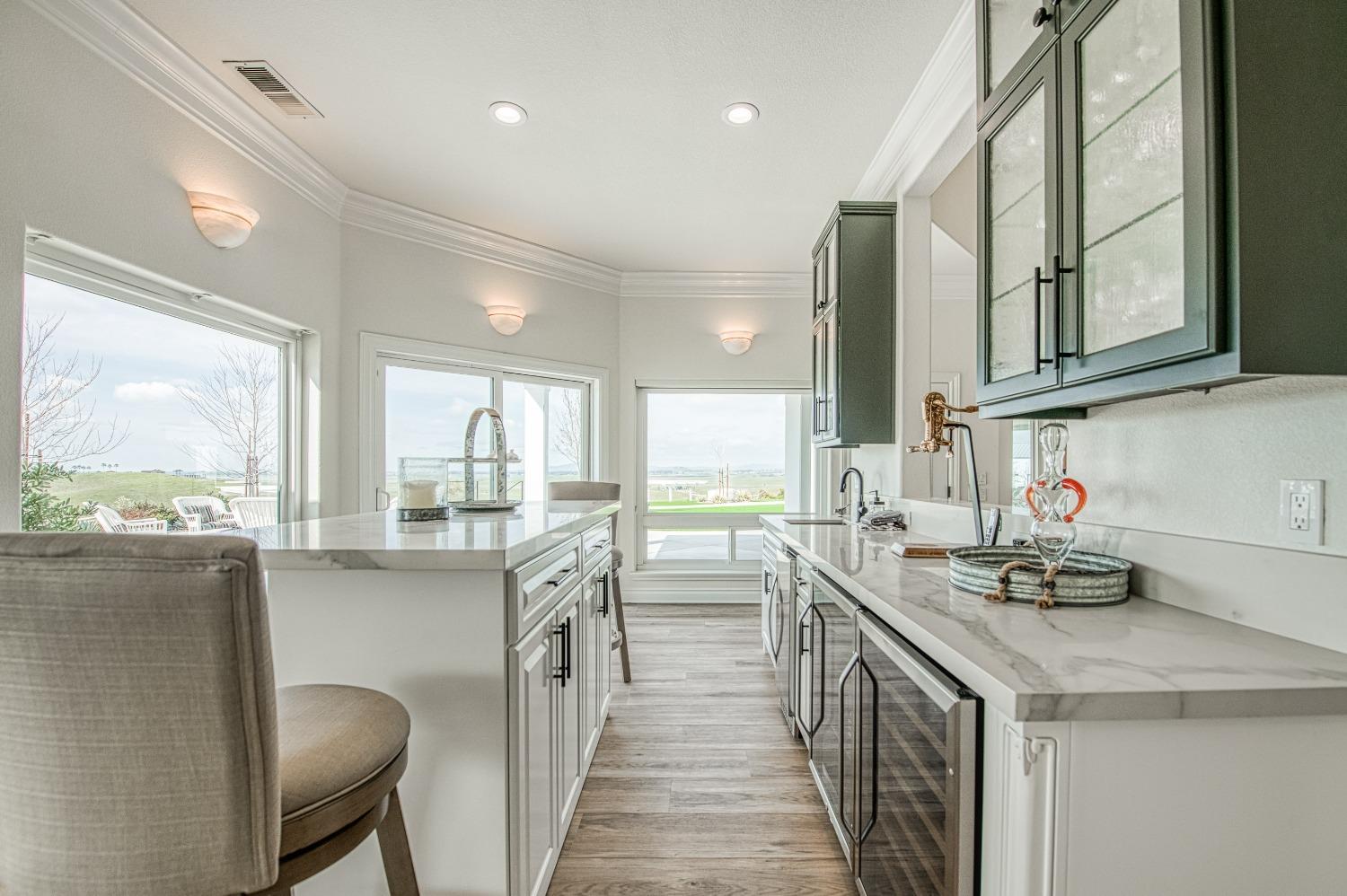 18300 Watts Valley Road Sanger, CA 93657 - Photo 16 of 78 a kitchen with counter top space cabinets and appliances