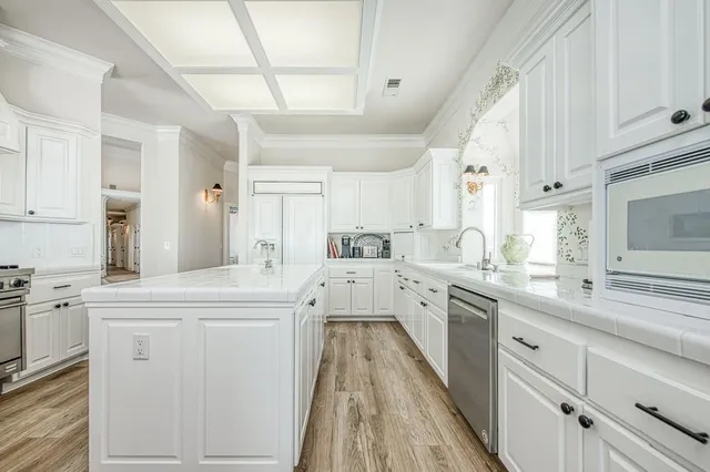 a view of yard with patio