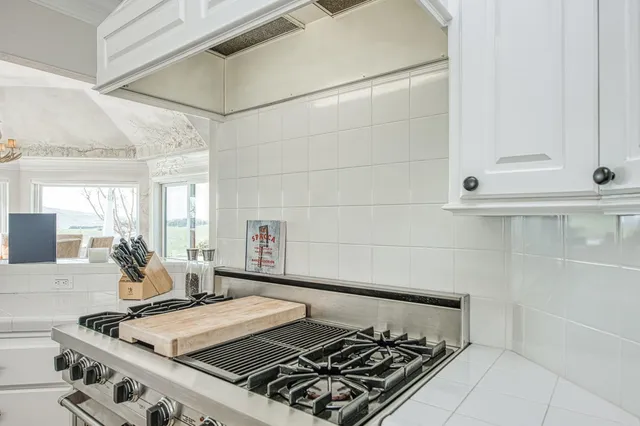 a view of a golf course with a house