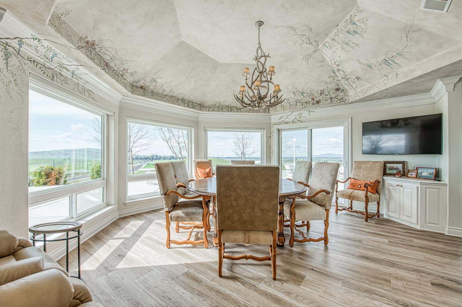 18300 Watts Valley Road Sanger, CA 93657 - Photo 29 of 78 a view of a dining room with furniture window and wooden floor
