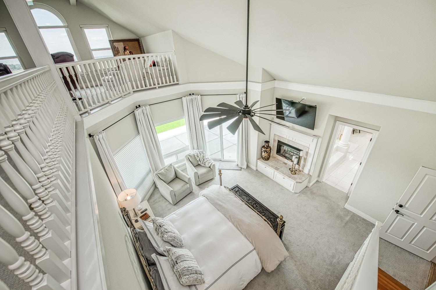 18300 Watts Valley Road Sanger, CA 93657 - Photo 44 of 78 a living room with furniture and a fireplace