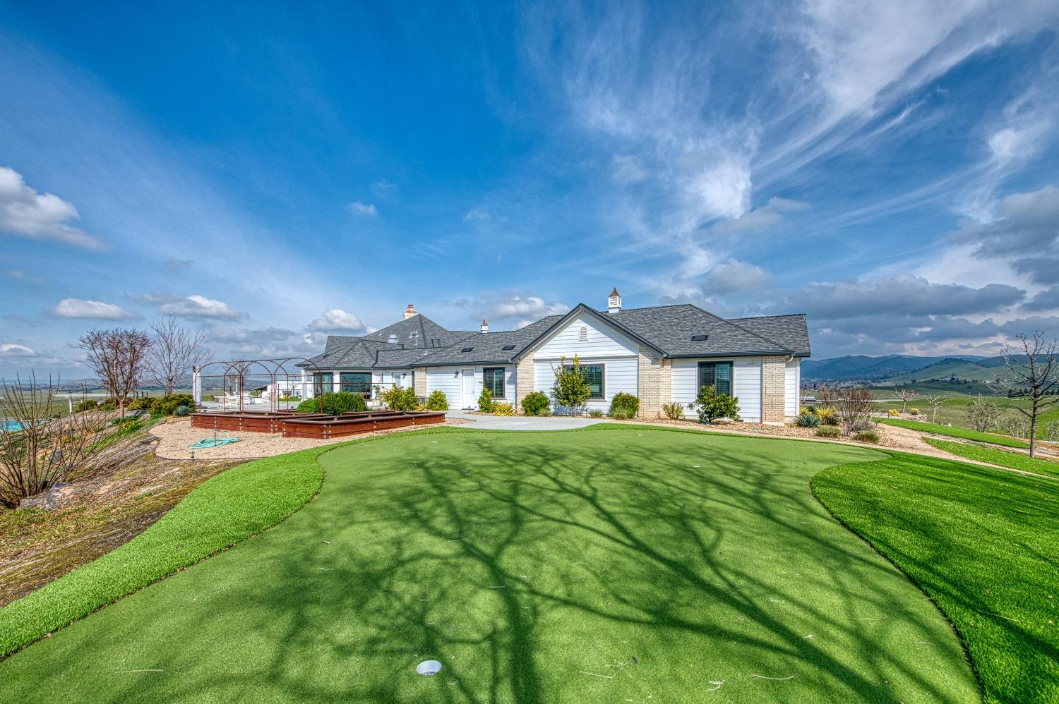 18300 Watts Valley Road Sanger, CA 93657 - Photo 75 of 78 a front view of a house with a yard