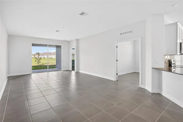 a bathroom with a sink toilet a mirror and shower