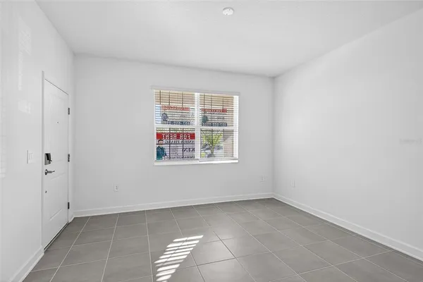a view of a room that has a window in it