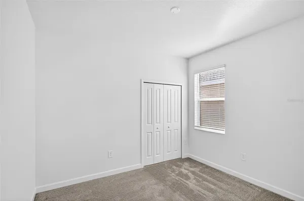 a view of a city with an ocean view