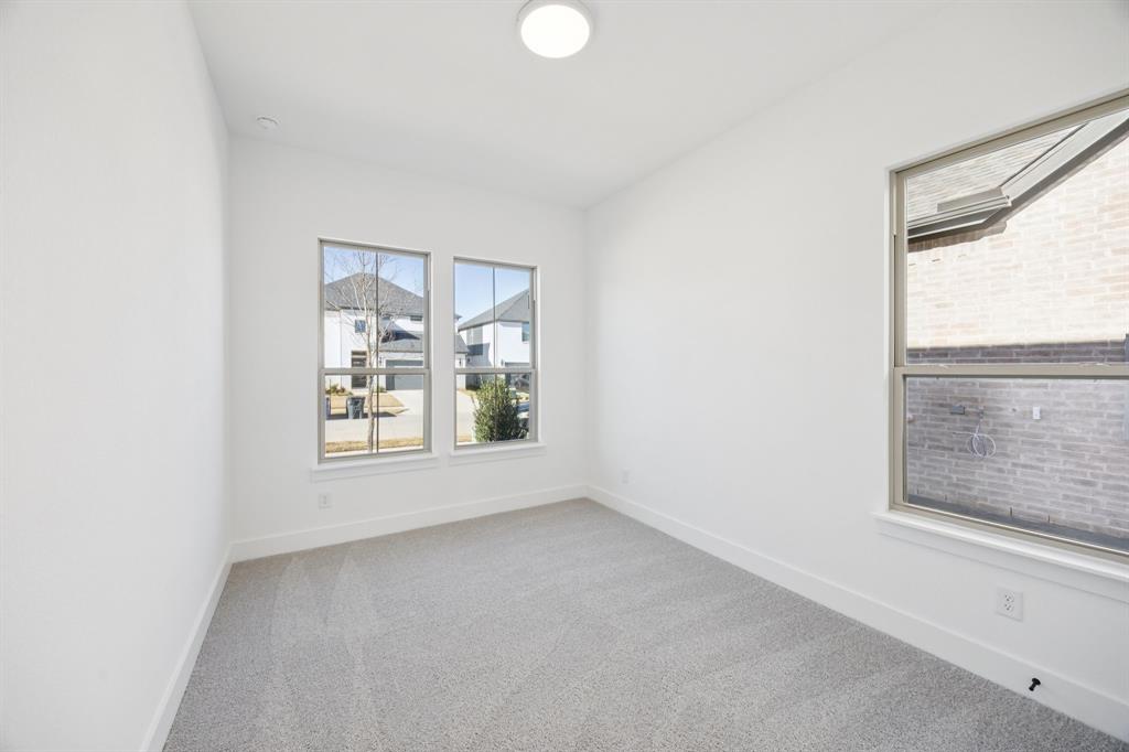 3412 Aldrich Road McKinney, TX 75071 - Photo 11 of 38 an empty room with a window