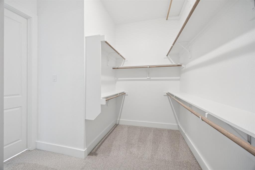 3412 Aldrich Road McKinney, TX 75071 - Photo 20 of 38 a view of an empty walk in closet
