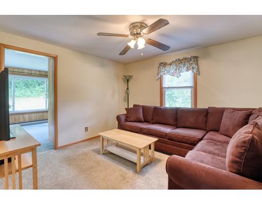 72 Burt Road Springfield, MA 01118 - Photo 11 of 19 a living room with furniture and a ceiling fan