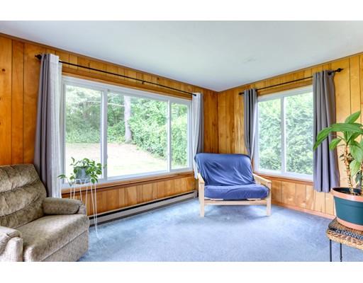 72 Burt Road Springfield, MA 01118 - Photo 16 of 19 a living room with furniture and a large window