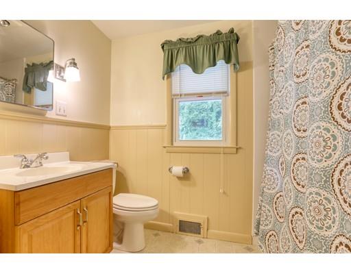72 Burt Road Springfield, MA 01118 - Photo 9 of 19 a bathroom with a sink toilet and mirror