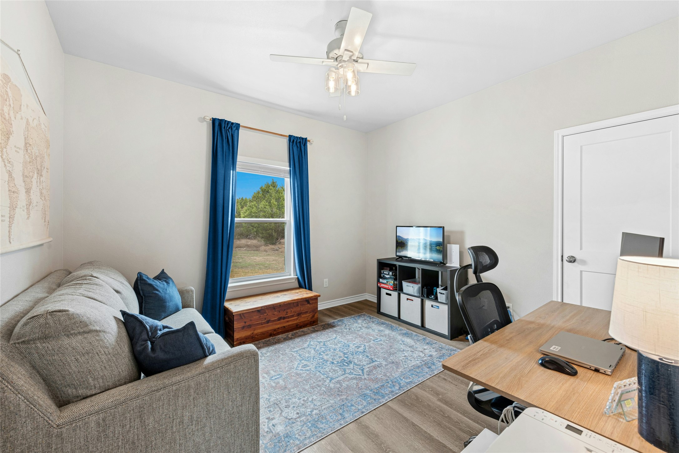 195 Rosebud Ranch Road Bertram, TX 78605 - Photo 30 of 40 a living room with furniture and a window