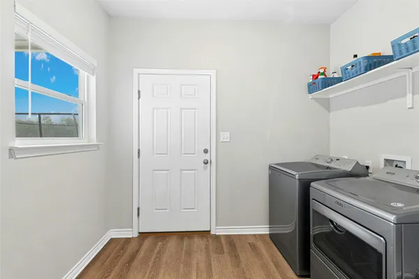 a view of utility room with washer and dryer