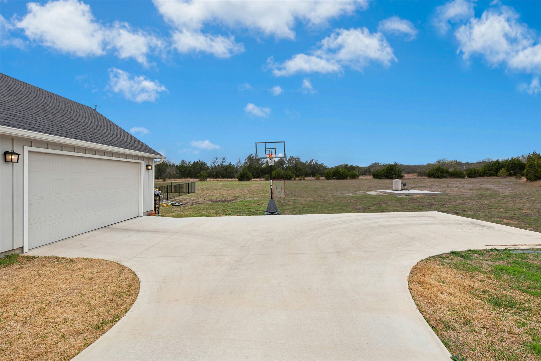 195 Rosebud Ranch Road Bertram, TX 78605 - Photo 34 of 40 a view of an outdoor space and a yard