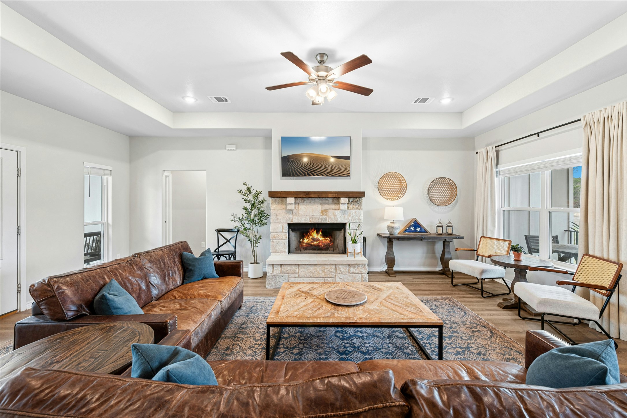195 Rosebud Ranch Road Bertram, TX 78605 - Photo 7 of 40 a living room with furniture and a fireplace