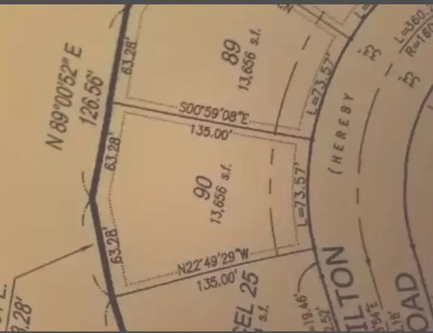 a view of roof with city view