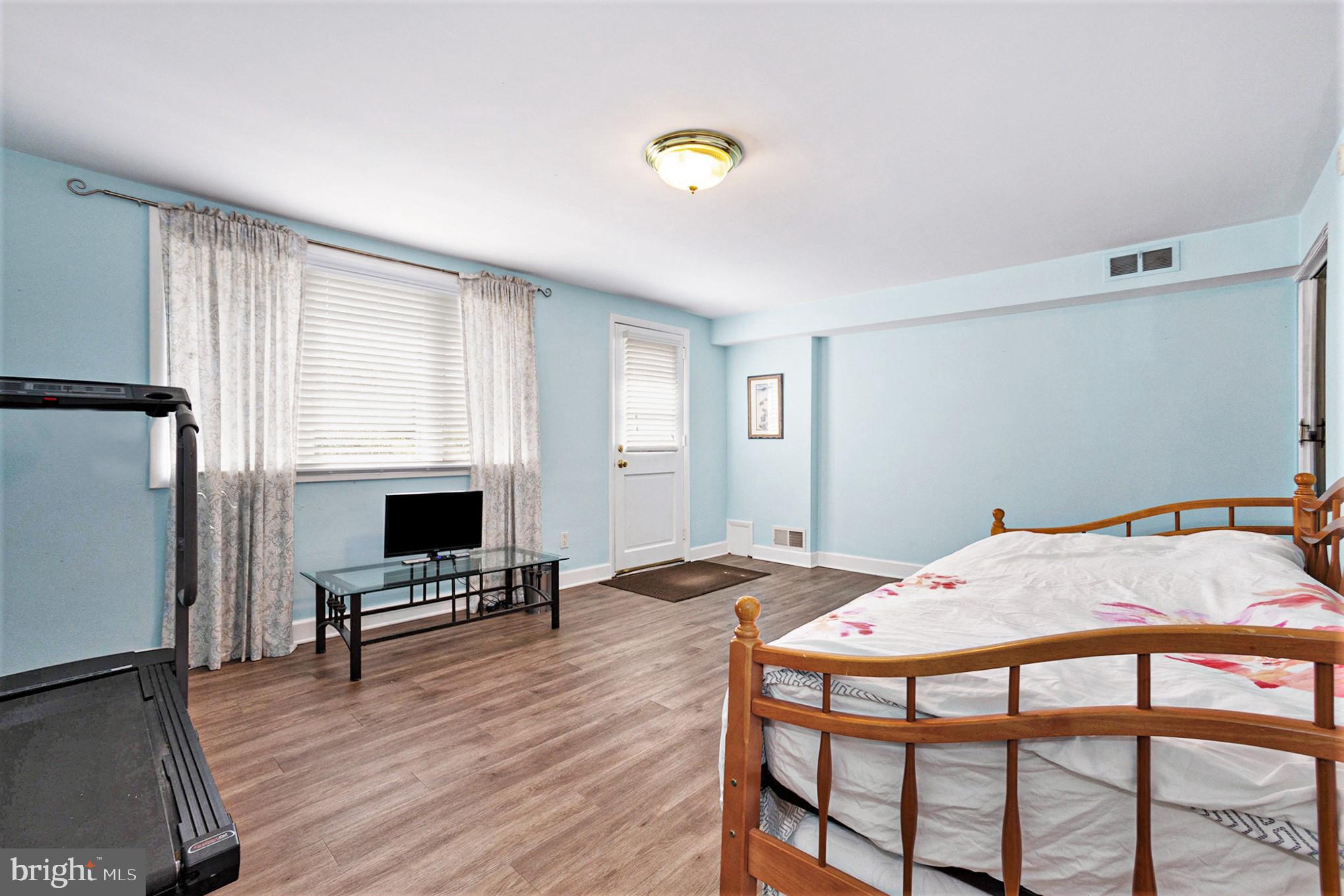 350 Red Coat Lane Wayne, PA 19087 - Photo 26 of 38 Lower level family room opens out to the side