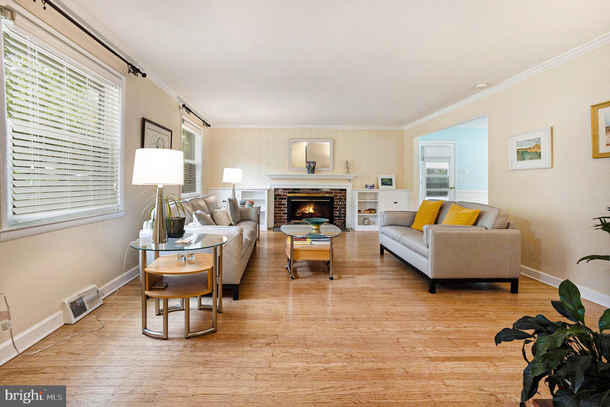350 Red Coat Lane Wayne, PA 19087 - Photo 7 of 38 Spacious living room with wood burning fireplace