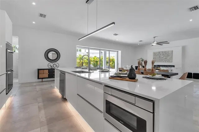 a bathroom with a double vanity sink and mirror