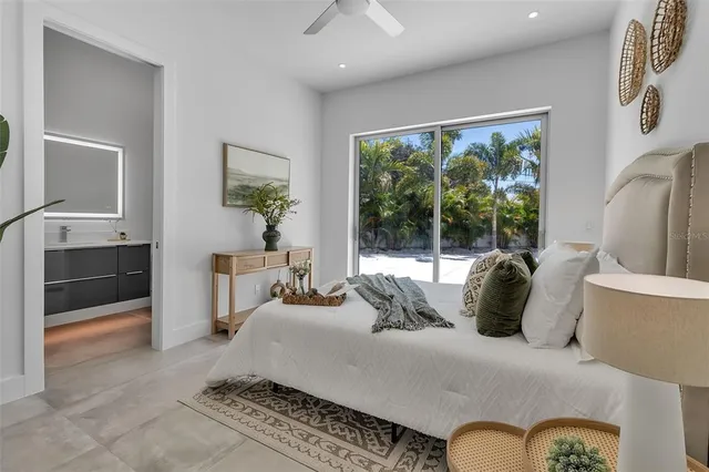 a living room with furniture and view of kitchen
