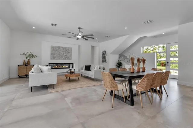 a view of a dining room with furniture window and outside view