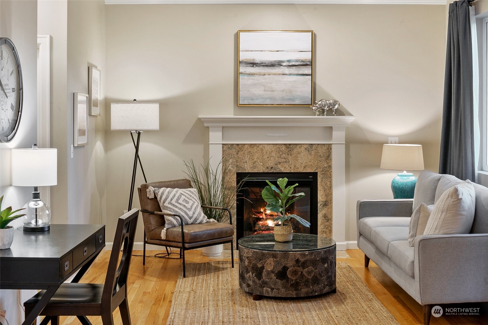 14704 Simonds Road Northeast Bothell, WA 98011 - Photo 12 of 40 a living room with furniture and a fireplace