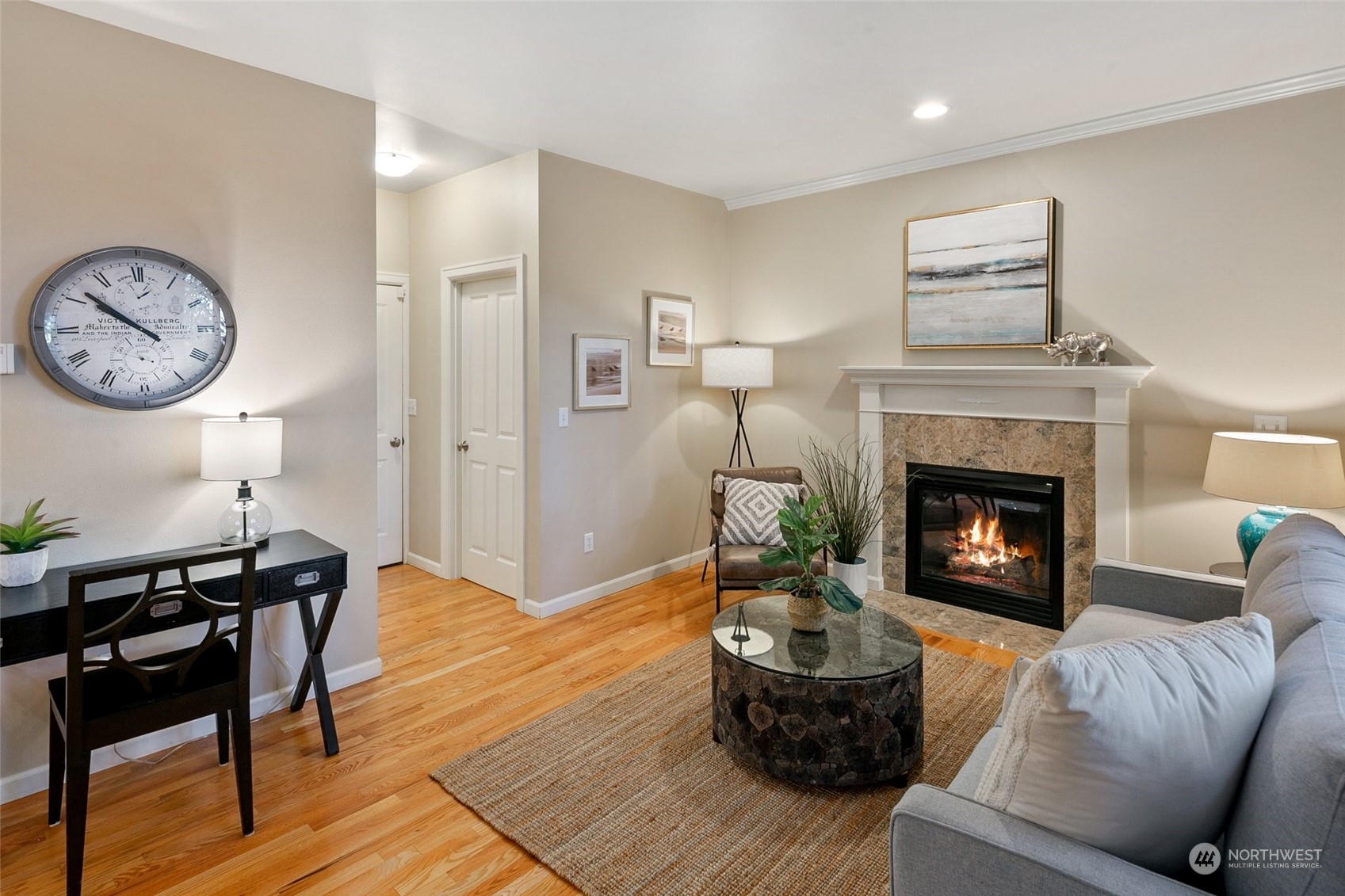 14704 Simonds Road Northeast Bothell, WA 98011 - Photo 13 of 40 a living room with furniture and a fireplace