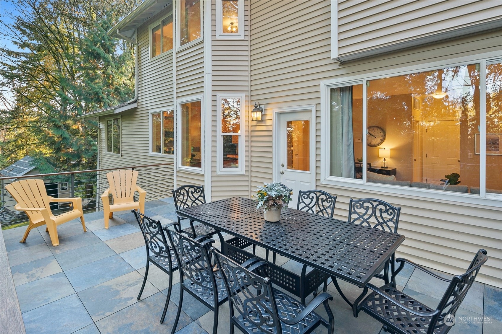 14704 Simonds Road Northeast Bothell, WA 98011 - Photo 17 of 40 a balcony with table and chairs and potted plants