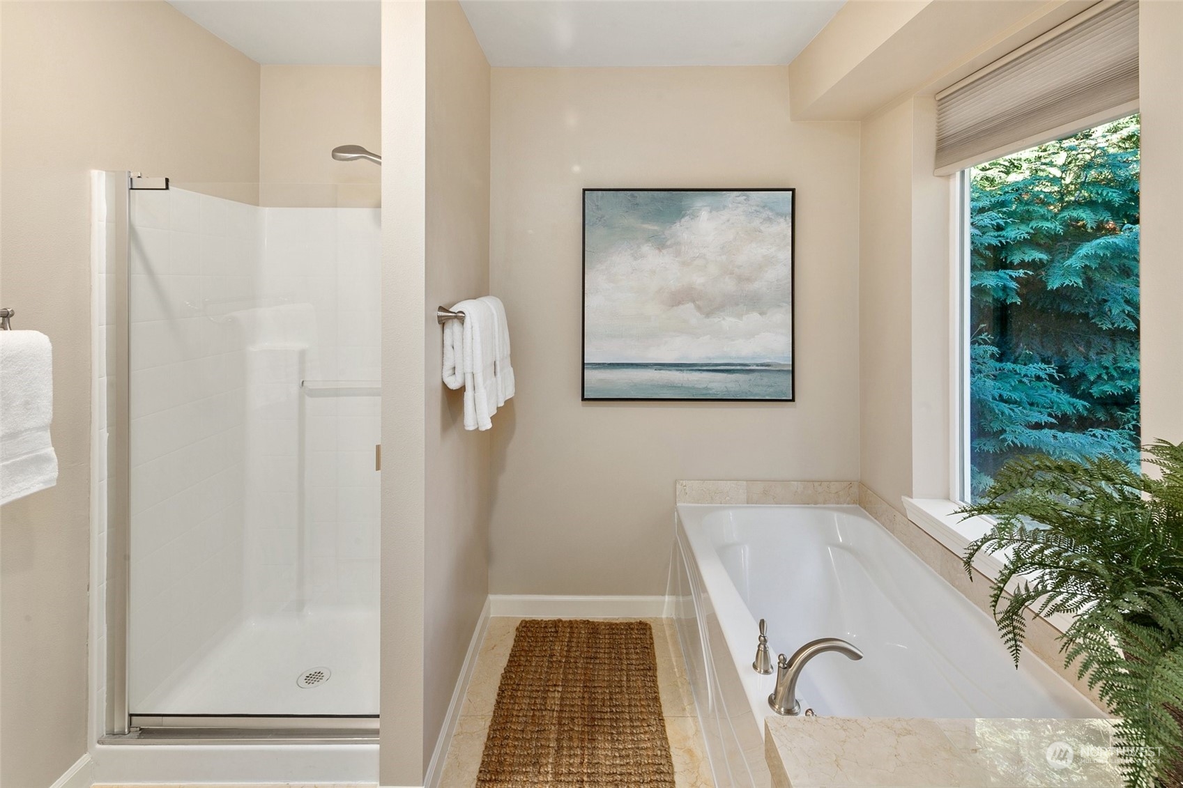 14704 Simonds Road Northeast Bothell, WA 98011 - Photo 21 of 40 a bathroom with a tub and shower