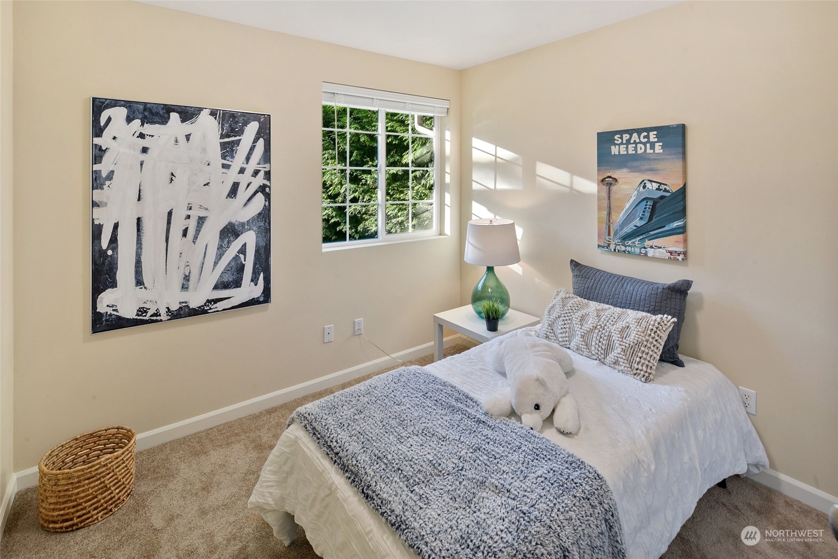 14704 Simonds Road Northeast Bothell, WA 98011 - Photo 24 of 40 a bedroom with a bed and a painting on the wall