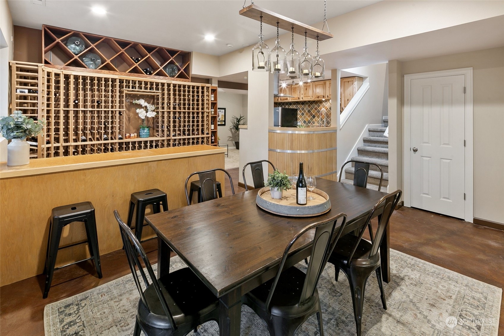 14704 Simonds Road Northeast Bothell, WA 98011 - Photo 26 of 40 a view of a dining room with furniture