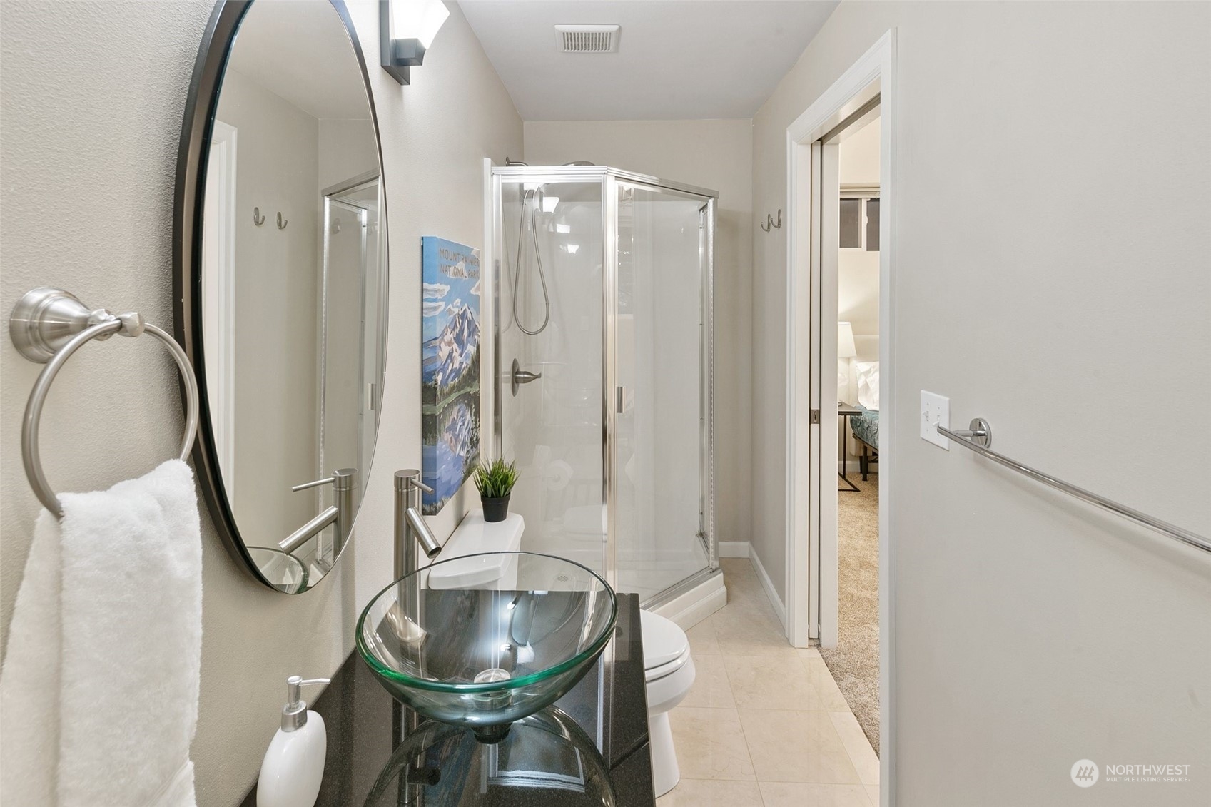 14704 Simonds Road Northeast Bothell, WA 98011 - Photo 31 of 40 a bathroom with a sink and a mirror