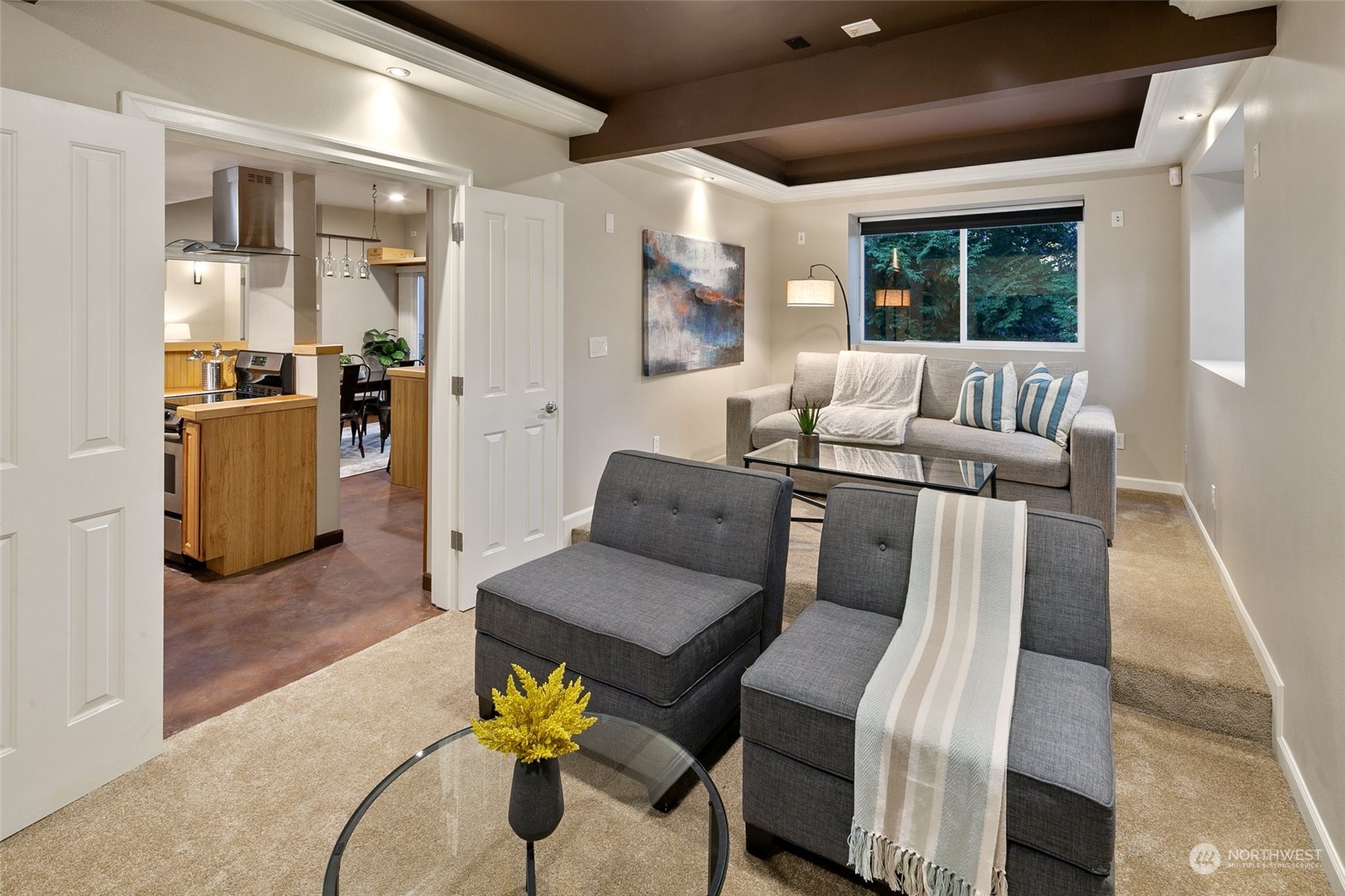 14704 Simonds Road Northeast Bothell, WA 98011 - Photo 32 of 40 a living room with furniture and a wooden floor