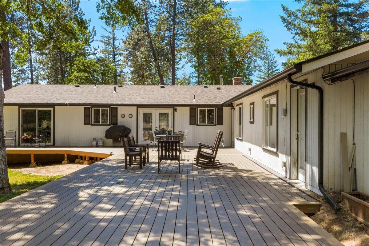 324 China Gulch Road Jacksonville, OR 97530 - Photo 35 of 45 a view of a house with pool and sitting area