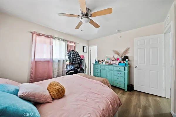 a bed room with a bed and a walk in closet