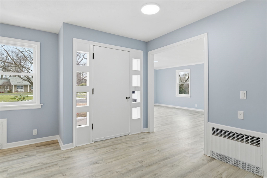 259 Ohio Avenue West Springfield, MA 01089 - Photo 5 of 30 wooden floor in an empty room with a window