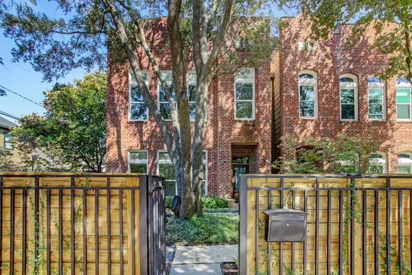 front view of a house with a trees